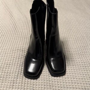 Ankle height black leather boots size 8.5. Brand new never worn